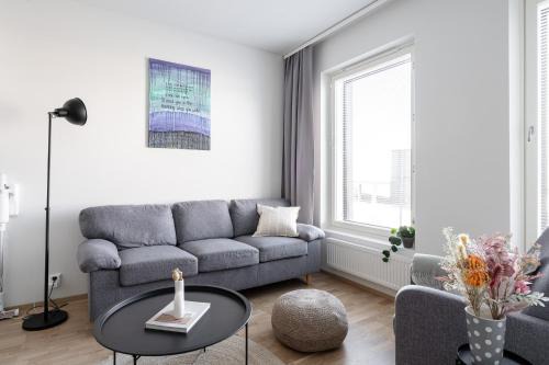 Modern 1BR Apartment with Sauna & Balcony