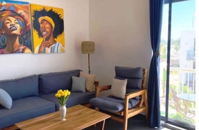 Modern 2-bedroom flat with pool & balcony near beach, a digital nomad's favorite