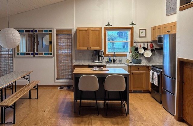 Modern 2Bd Tri-Level Home in ER Village with Large Fenced-In Yard - Dog Friendly