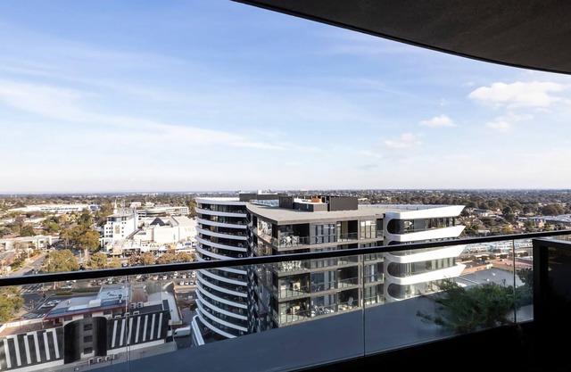 Modern 2BR Abode with Balcony View Gym Access