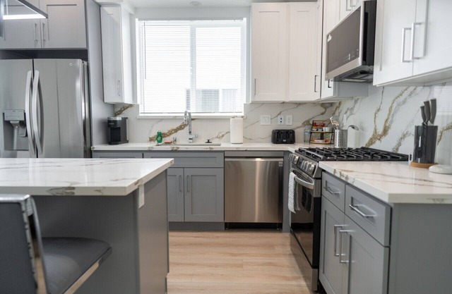 MODERN 3-4 BR TOWNHOME BUILT 2023 w/ OFFICE, BONUS ROOM, GARAGE & EV CHARGER p64
