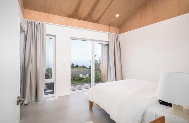 Modern 4 Bedroom, 4.5 bath home near Cabot Links with ocean views and sunsets.