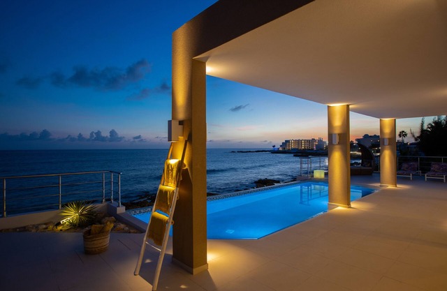 Modern 4 bedroom villa with swimming pool offering magnificent sea views