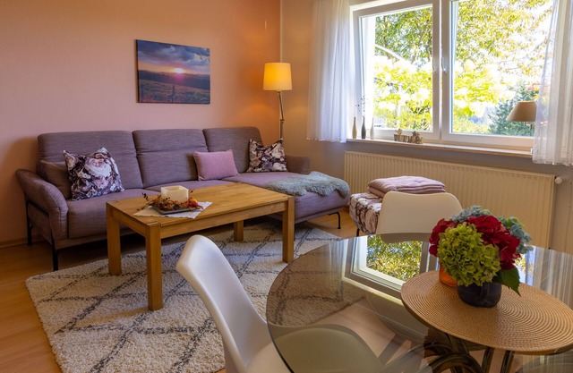 Apartamento moderno de 61 m2 con sauna y terraza, a ras del suelo.