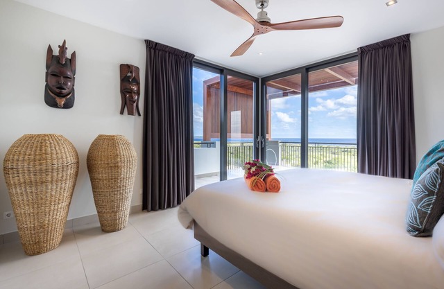 Modern apartment w/ 180° sea views & shared pool