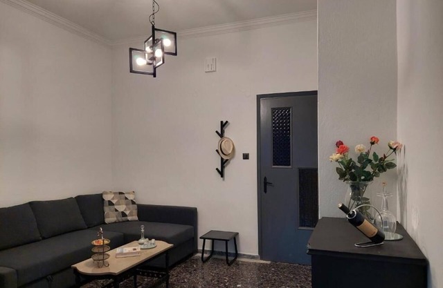 Modern apt with private garden next to the beach in the center of Elounda!