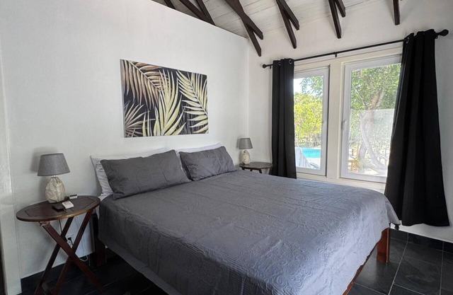 Modern Beachfront Home - Steps from the Sea w/ Patio, Shared Pool & Dock