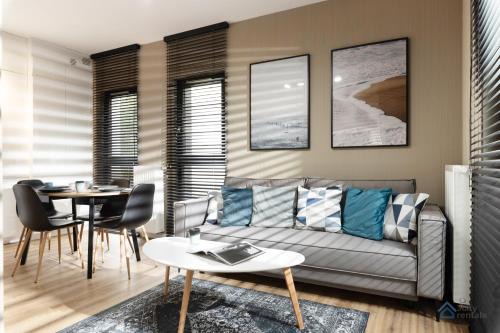 Modern Beige and Grey 3city Apartment in Gdynia by Noclegi Renters