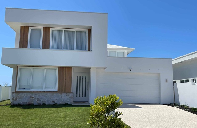 Modern Boho Retreat with Pool, Yard & Beaches Just Minutes Away