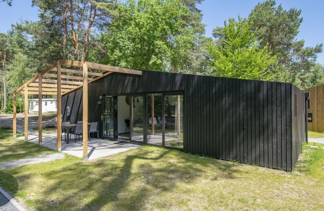 Chalet moderno con bienestar, en un parque de vacaciones a 12 km. de Eindhoven