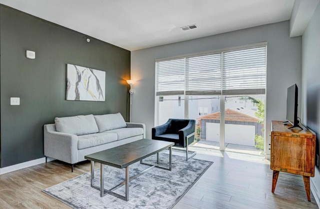 Modern Chic 2 BR w Free Garage Parking by Stay Gia