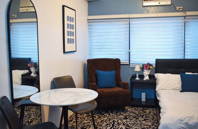 Modern Chic Condo with Pool & Gym in Katipunan Ave, Quezon City - Slate Studio
