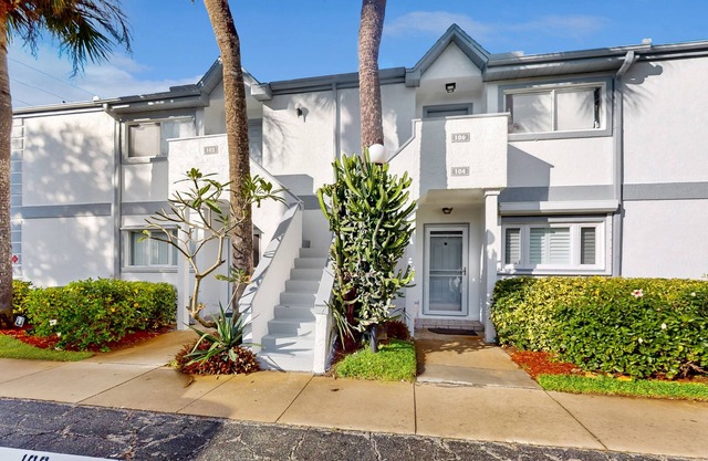 Modern condo with beach access, firework views, W/D, & balcony - dog-friendly