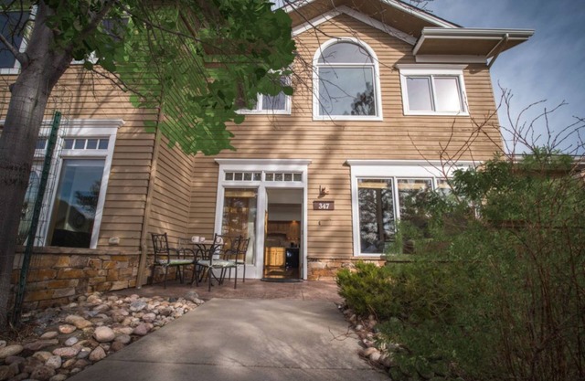 Modern condo with cozy fireplace, private hot tub, and Jacuzzi!