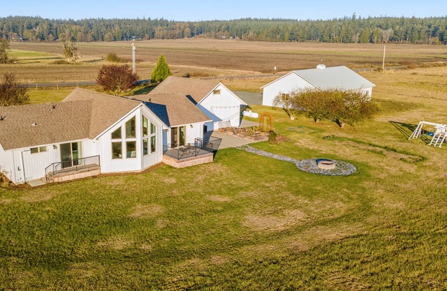 Modern, dog-friendly home with sweeping views, deck, firepit, & gas fireplace