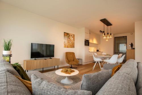 Modern en gezellig appartement vlak aan het strand