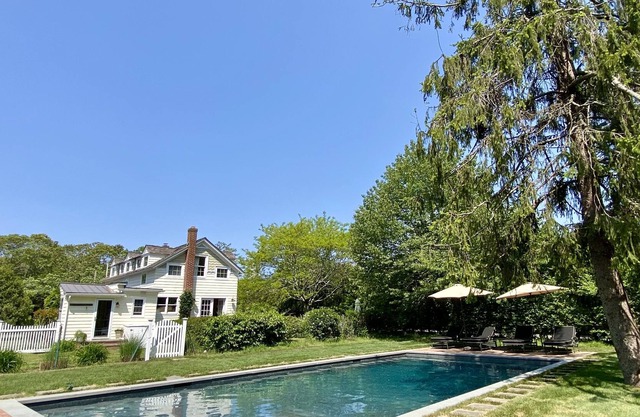Modern farmhouse with pool + gorgeous yard, minutes from the beach.