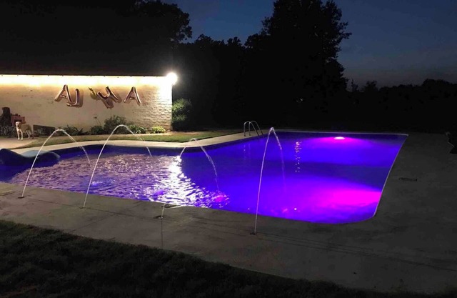 Modern Farmhouse on 6 acres, 7 bedrooms, with a pool.