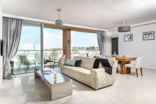 Modern Gem with Stunning Balcony by Sea N' Rent