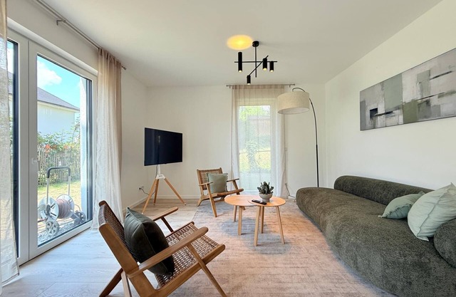 Modern Harmony suite with covered terrace near the lake and beach in Uhldingen-
