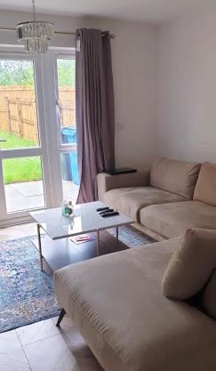 Modern Home with Private Garden and Car Park in Manchester