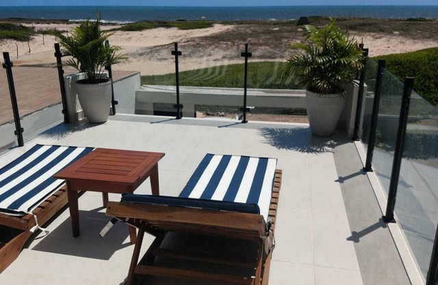 Modern house, BEACHFRONT, with private pool and barbecue area
