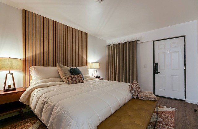 Modern King Room with Plush Bedding – Perfect for Business or Leisure Stays!