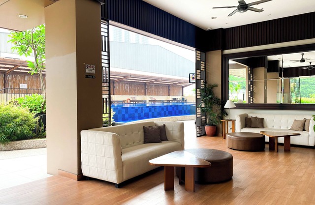 Modern Look and Restful Studio at Azalea Suites Apartment