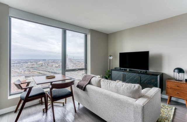 Modern North Station Studio w/ Gym & W/D, nr Dining, by Blueground