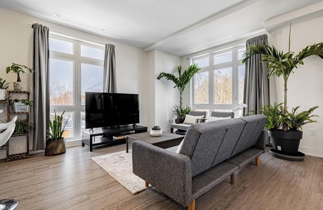 Modern open-concept, 2-bedroom townhouse with plenty of natural light.
