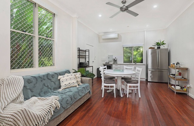 Modern retreat set amongst tropical garden, central to everything on the Coast.
