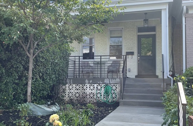 Modern Rowhouse with Patio Dining and Parking