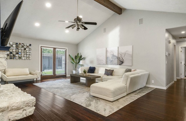 Modern space in south Tulsa w/ outdoor firepit, kitchen, turf, & string lights!