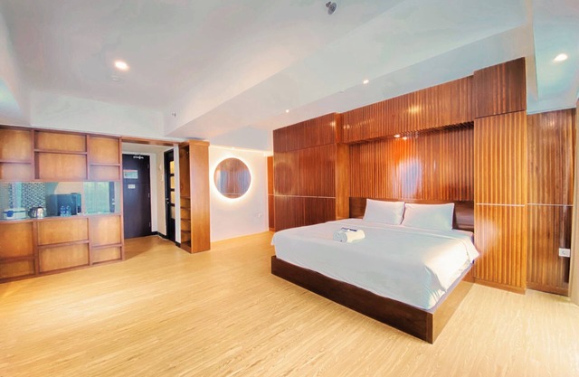 Modern Studio Room Apartment At Tamansari La Grande