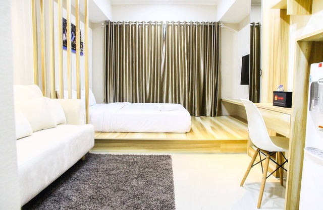 Modern Style The Oasis Studio Apartment with Comfortable Sofa