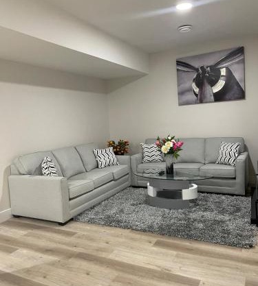 Modern suite in basement Upland
