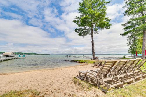 Modern Torch Lake Cottage with Dock Near Ski Resorts