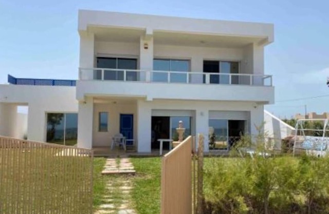 Modern Villa Feet In The Water