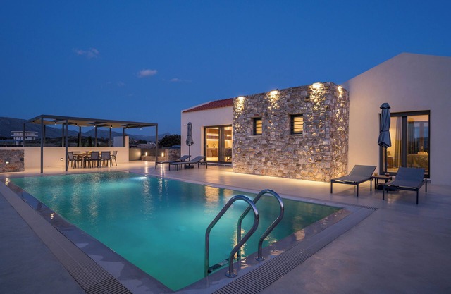 Modern villa with private heated pool and great view!!