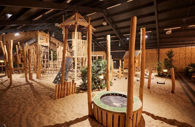 Villa moderna con habitación infantil temática en un parque de vacaciones en Limburg