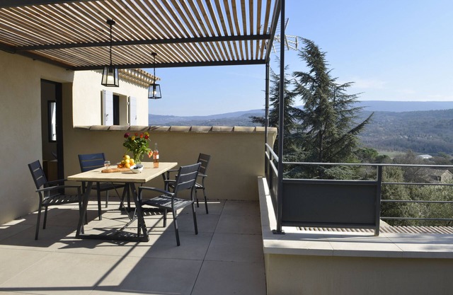 Modern village house with heated swimming pool and superb view of the Luberon.