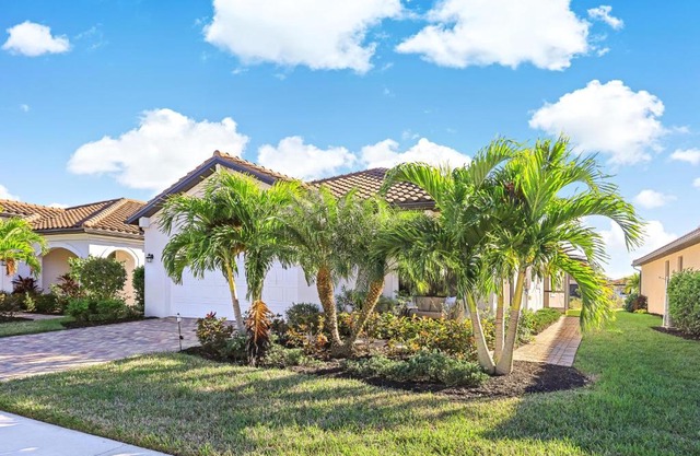 Modern waterfront home in Artesia with pool/gym