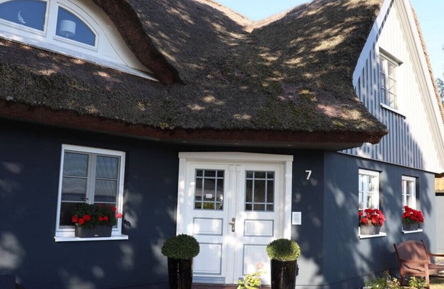 Moderne Fewo in Einem Reetgedecktem Haus mit Blick auf dem Bodden - Heck
