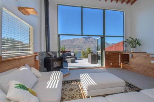 Mountain, lake, sun and this beautiful home