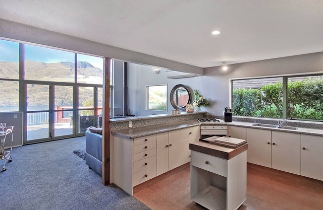 Mountain, lake, sun and this sensational home