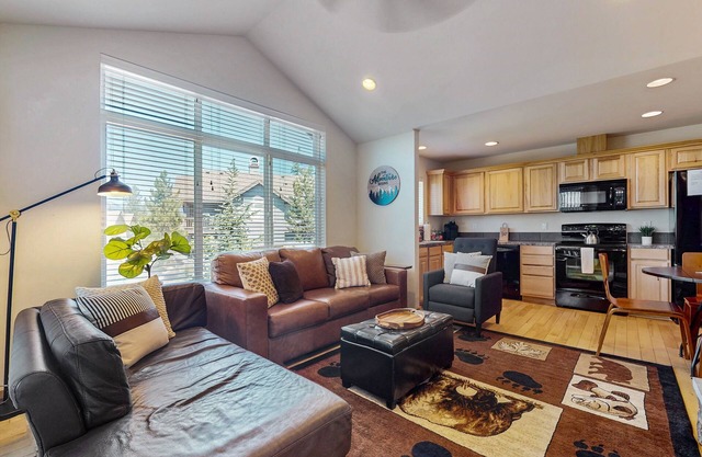Mountain view condo with balcony, fireplace, pool, hot tub, gym & tennis