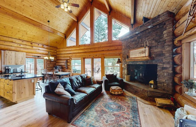 Mountain-view dog-friendly cabin with hot tub, wood stove, central AC, & W/D