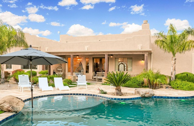 Mountain-view stay with sprawling outdoor space, pool, hot tub, & putting green