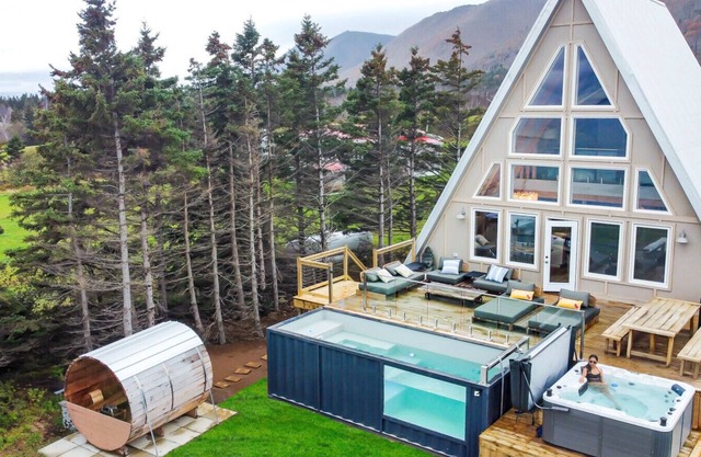 Mystical Beachfront Chalet , Hot tub , Sauna and Heated Container Pool.