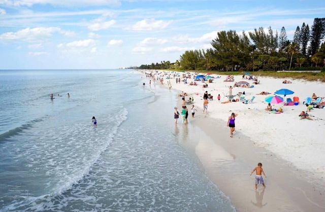 Oasis in Naples, Florida - Featuring a Heated Pool